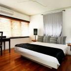 Large plush beds set with designer linens - Angsana Palm Cove